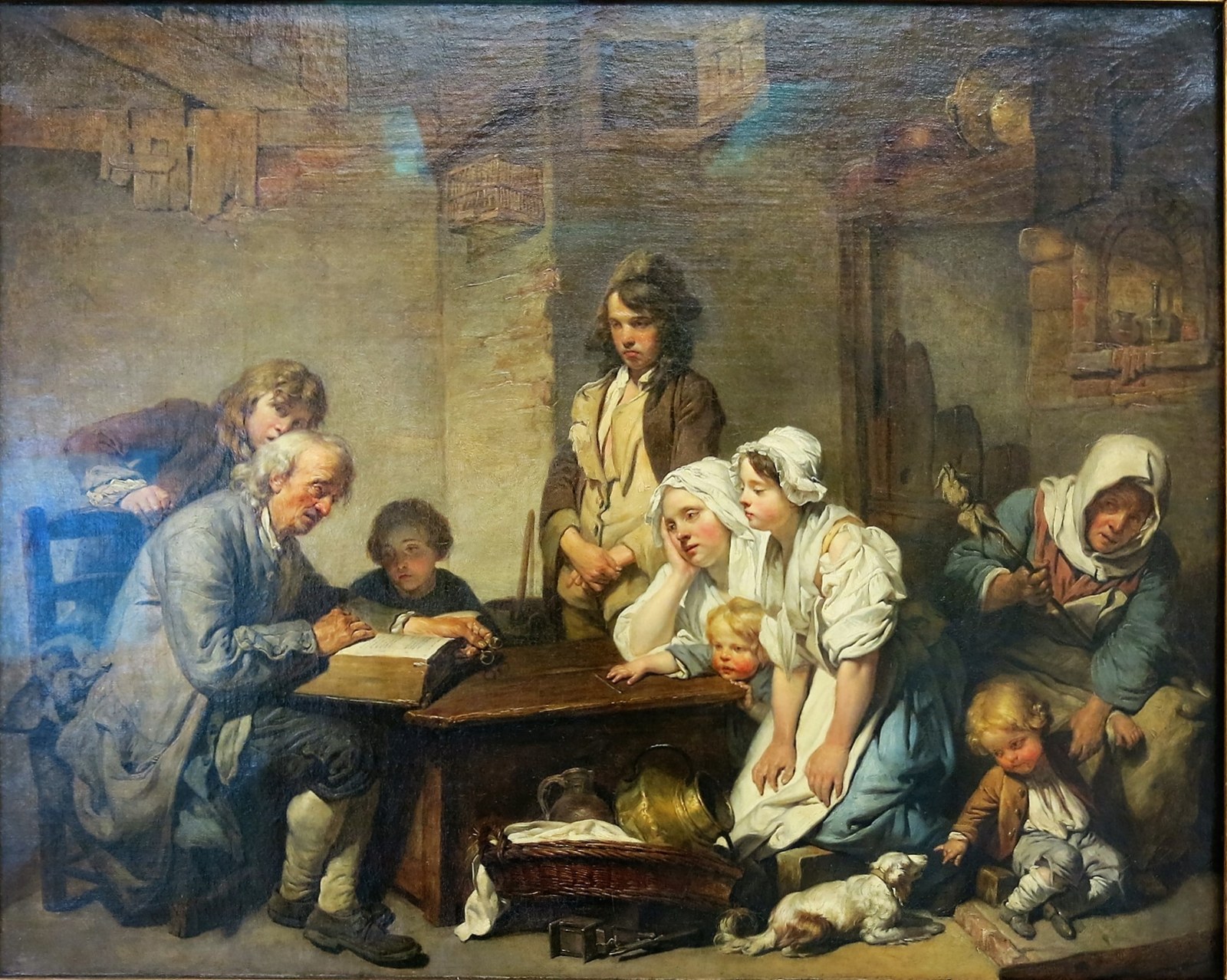 Eighteenth-century painting of a family gathered around a table in a plain farmhouse room. A white-haired father reads aloud from a large open Bible while his wife, children, and grandmother listen, and a small dog plays at their feet.